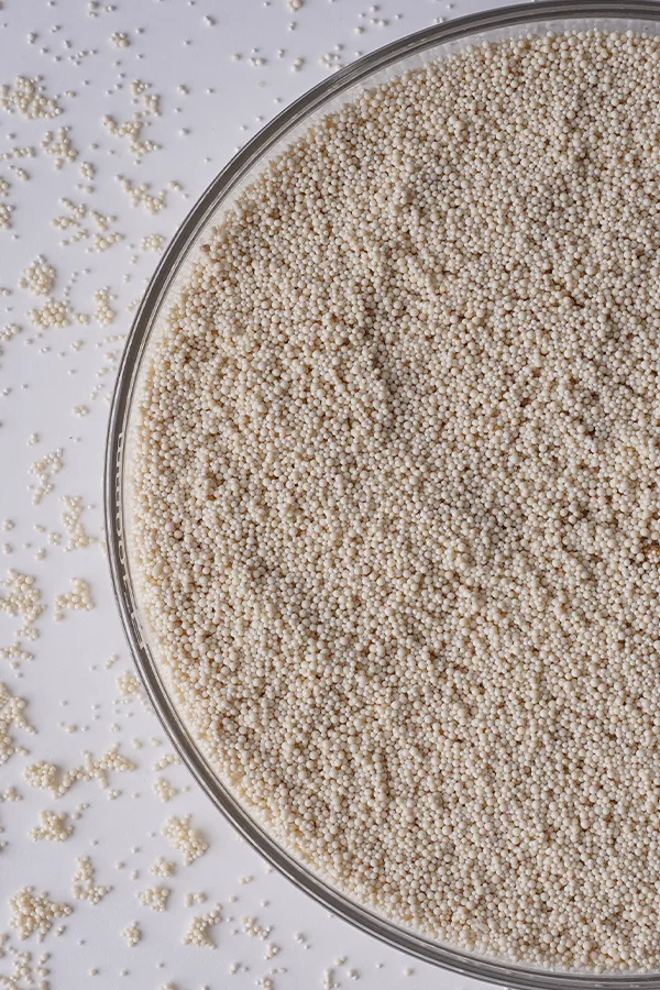 A bowl of light brown chelating resins.