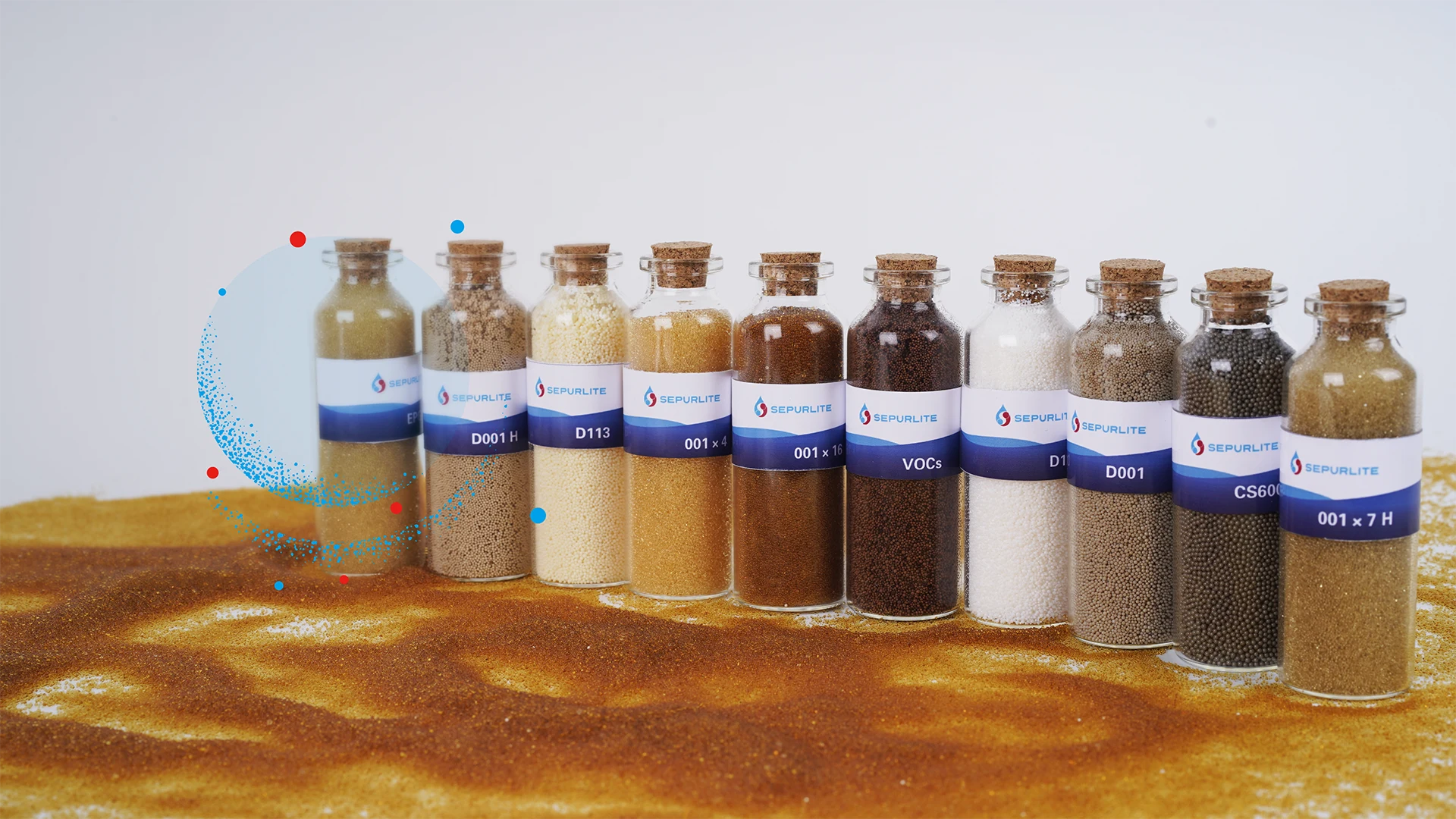 Several different types of ion exchange resins and adsorption resins on gray background.